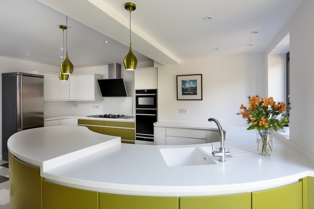 Modern Curved Handleless Kitchen With Corian Worktops Kestrel