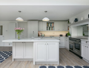 Open plan kitchen with centre island by Kestrel Kitchens