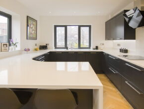 Curved worktop with waterfall edges - Kestrel Kitchens