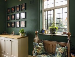 Custom church pew and traditional cabinetry in bootroom