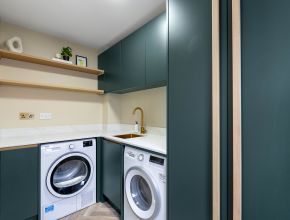 utility room matching kitchen design by kestrel kitchens